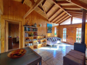 Acogedora casa con Bosca interior, a solo pasos de la Laguna.